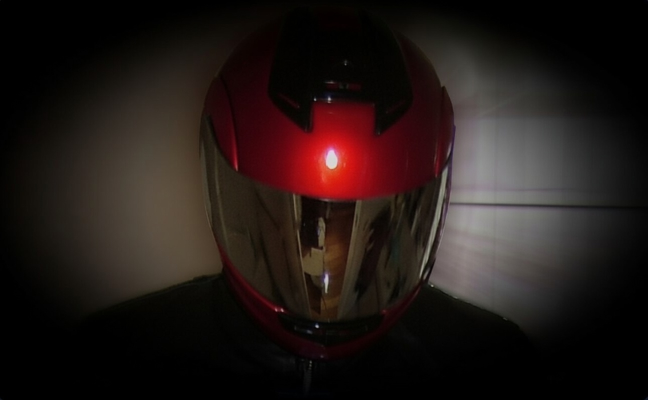 Red HJC motorcycle helmet